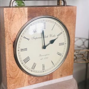 Vintage wooden clock with marble base.